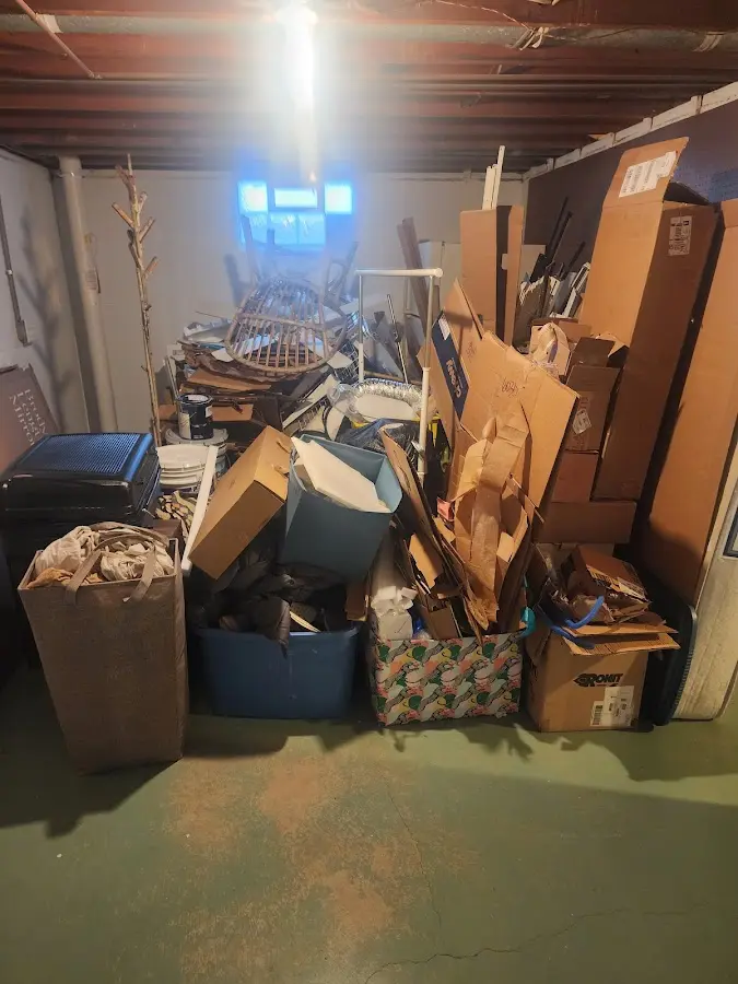 Roll-off dumpster container at job site for Yard Waste Dumpster Rental in Harborcreek